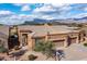 Inviting single-story home with desert landscaping and mountain views in a serene desert setting at 7380 E Canyon Wren Dr, Gold Canyon, AZ 85118
