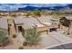 Beautiful desert home with three-car garage, mature trees and low maintenance landscape at 7380 E Canyon Wren Dr, Gold Canyon, AZ 85118