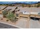 Charming desert home with three-car garage, attractive landscaping and mountain views at 7380 E Canyon Wren Dr, Gold Canyon, AZ 85118