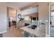 Spacious kitchen with granite countertops and appliances, offering convenient access to the dining area at 7380 E Canyon Wren Dr, Gold Canyon, AZ 85118