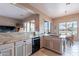 Beautiful kitchen area with stainless appliances, granite countertops, and ample natural light at 7380 E Canyon Wren Dr, Gold Canyon, AZ 85118
