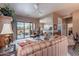 Cozy living room with lots of natural light and access to an outdoor patio at 7380 E Canyon Wren Dr, Gold Canyon, AZ 85118