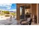 Outdoor patio with scenic views, perfect for relaxation and enjoying the natural surroundings through a sliding door at 7380 E Canyon Wren Dr, Gold Canyon, AZ 85118