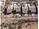 Aerial view of backyard patios with desert landscaping, perfect for outdoor living at 7380 E Canyon Wren Dr, Gold Canyon, AZ 85118