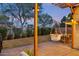 A backyard featuring a pergola and patio table with chairs for a peaceful outdoor area at 741 N Cholla St, Chandler, AZ 85224