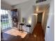 Welcoming entrance hall with hardwood floors, stylish decor, and plenty of natural light at 817 N 95Th Pl, Mesa, AZ 85207