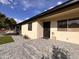 Charming front entrance with a stylish pathway and a secure front door at 817 N 95Th Pl, Mesa, AZ 85207