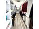 Well-organized walk-in closet providing ample shelving and storage for clothing and accessories at 817 N 95Th Pl, Mesa, AZ 85207