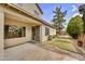 Home's backyard featuring a covered patio area and well-maintained lawn at 863 E Waterview Pl, Chandler, AZ 85249