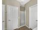 Bathroom featuring a glass-enclosed shower with tile flooring and neutral wall colors at 863 E Waterview Pl, Chandler, AZ 85249