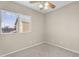 Comfortable bedroom with a ceiling fan and window, perfect for a peaceful retreat at 863 E Waterview Pl, Chandler, AZ 85249