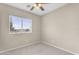 Sunny bedroom featuring carpet and a window, perfect for relaxation and personalization at 863 E Waterview Pl, Chandler, AZ 85249
