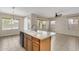 Open floor plan showcasing a kitchen island flowing into a spacious dining area at 863 E Waterview Pl, Chandler, AZ 85249