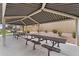 Covered picnic area with multiple tables and seating, providing a comfortable space for outdoor dining and socializing at 863 E Waterview Pl, Chandler, AZ 85249
