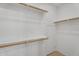 Spacious walk-in closet with shelving, offering ample storage and organization solutions at 863 E Waterview Pl, Chandler, AZ 85249