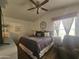Cozy bedroom with neutral tones, plush bedding, and a relaxing ambiance at 8700 E University Dr # 649, Mesa, AZ 85207