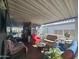 Inviting covered patio with comfortable seating, perfect for relaxing and entertaining guests at 8700 E University Dr # 649, Mesa, AZ 85207