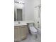 Bathroom featuring a shower, vanity, and an efficient toilet with bidet function at 1009 E Brentrup Dr, Tempe, AZ 85283
