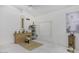 Airy bedroom with white walls and decor at 1009 E Brentrup Dr, Tempe, AZ 85283