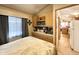 View of bedroom showcasing custom storage and natural light at 1027 S Prospector Dr, Apache Junction, AZ 85119