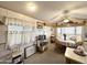 Well-lit dining area with a ceiling fan, creating a comfortable atmosphere at 1027 S Prospector Dr, Apache Junction, AZ 85119