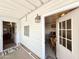 Open porch entrance providing a glimpse into the dining area and living spaces at 1027 S Prospector Dr, Apache Junction, AZ 85119