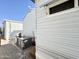 Property exterior, paved patio and air conditioner at 1027 S Prospector Dr, Apache Junction, AZ 85119
