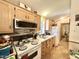 Well-equipped kitchen with white appliances and generous counter space at 1027 S Prospector Dr, Apache Junction, AZ 85119