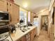 Well-maintained kitchen features white appliances and tile flooring at 1027 S Prospector Dr, Apache Junction, AZ 85119