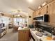 Open kitchen showcases a dining area and modern appliances at 1027 S Prospector Dr, Apache Junction, AZ 85119