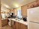 Kitchen boasts ample counter space, storage, and modern appliances at 1027 S Prospector Dr, Apache Junction, AZ 85119