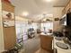 Bright kitchen with adjacent dining space and ample natural light at 1027 S Prospector Dr, Apache Junction, AZ 85119