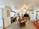 Cozy living area featuring a ceiling fan, natural lighting, and comfortable furnishings at 1027 S Prospector Dr, Apache Junction, AZ 85119