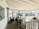 Inviting covered porch with comfortable seating, perfect for relaxing and enjoying the community view at 1027 S Prospector Dr, Apache Junction, AZ 85119