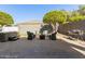 Backyard featuring a patio area with seating and barbecue at 10822 E Ramblewood Cir, Mesa, AZ 85212