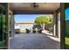 Covered patio with outdoor seating, a hot tub and a barbecue at 10822 E Ramblewood Cir, Mesa, AZ 85212