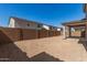 Spacious backyard with potential for landscaping and outdoor activities at 11619 W Green Dr, Youngtown, AZ 85363