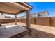 Covered backyard patio area providing shade and outdoor living space at 11619 W Green Dr, Youngtown, AZ 85363