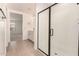 Beautiful bathroom featuring tile flooring, a glass shower enclosure, and a double vanity at 11619 W Green Dr, Youngtown, AZ 85363