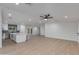 Expansive living area flowing to a modern kitchen, perfect for entertaining and gatherings at 12444 N 33Rd St, Phoenix, AZ 85032