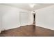 Bedroom features neutral walls and dark hardwood floors at 1266 E Elton Ave, Mesa, AZ 85204