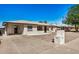 Charming single-story home with a rock landscape, covered parking and a mailbox near the street at 1266 E Elton Ave, Mesa, AZ 85204