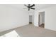 Comfortable bedroom showcasing carpet floors and access to other rooms through adjacent doorways at 13587 W Cypress St, Goodyear, AZ 85395