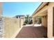Covered patio and decorative wall offer seclusion and a great outdoor space at 21047 N Alma Dr, Maricopa, AZ 85138