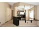 Kitchen featuring a breakfast bar, pendant lighting and an open concept design at 21047 N Alma Dr, Maricopa, AZ 85138