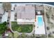 Stunning aerial view of property with lush backyard, sparkling pool, and well-maintained landscaping at 2106 N Bridlewood --, Mesa, AZ 85207