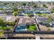 Aerial view of a backyard with a pool and manicured lawn in a residential neighborhood at 2214 E Sells Dr, Phoenix, AZ 85016