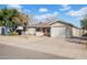 Inviting single-Gathering home with a neatly landscaped front yard and a driveway at 2214 E Sells Dr, Phoenix, AZ 85016