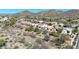 Scenic aerial view of a community nestled in the mountains at 28604 N 21St Ln, Phoenix, AZ 85085