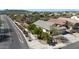 Aerial view of a cozy home, with a two-car garage, desert landscaping, and tile roof at 28604 N 21St Ln, Phoenix, AZ 85085